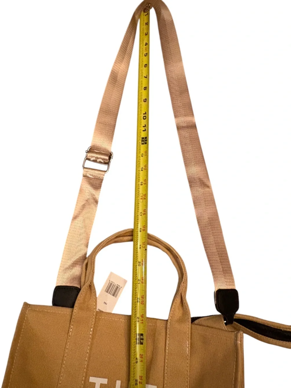 Marc Jacobs The Jacquard Tote Bag in the color Camel.